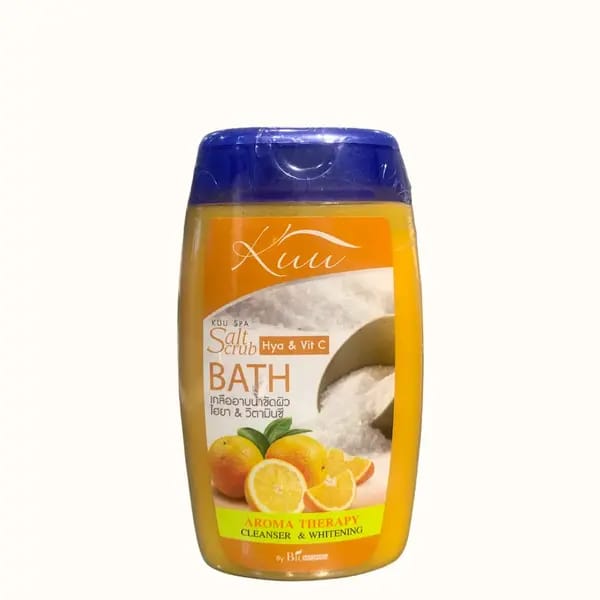 Bottle of KUU salt scrub bath with lemon flavor on a white background