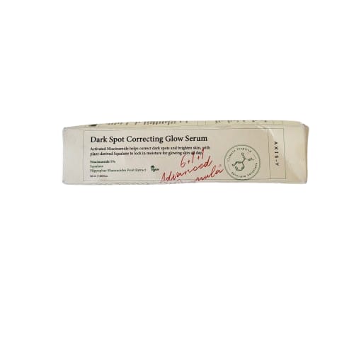Dark spot correcting glow serum packaging on a white background